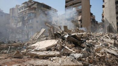 A conceptual image highlighting the Lebanon UN News, showing destroyed buildings with smoke rising in Beirut, alongside the United Nations logo and a call for peace.