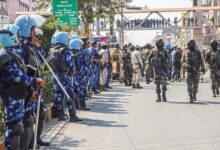 Read the latest update on Manipur Unrest. After a bomb blast killed 2 kids in Bishnupur, violent protests erupted, leading to police firing and internet suspension in 5 districts.